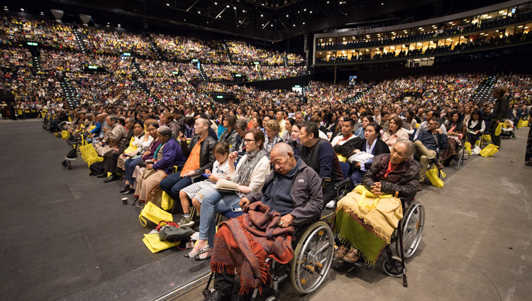 A view of many of the more than 9,000 people attending His Holiness the Dalai Lama's teaching at the Zurich Hallenstadion in Zurich, Switzerland on September 23, 2018. Photo by Manuel Bauer