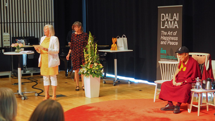 Vice Chancellor Cecilia Christersson introducing His Holiness the Dalai Lama before his talk at Malmö University in Malmö, Sweden on September 13, 2018. Photo by Jeremy Russell