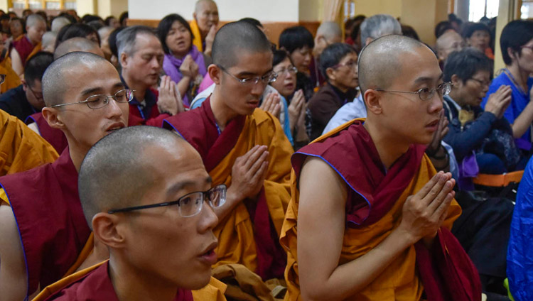 Members of the audience from Taiwan inside the Main Tibetan Temple reciting prayers at the start of His Holiness the Dalai Lama's teaching in Dharamsala, HP, India on October 3, 2018. Photo by Tenzin Phende/DIIR