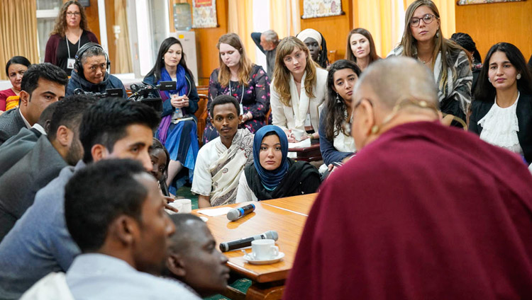 His Holiness the Dalai Lama talking with participants during a tea break in the discussion with youth leaders from conflict areas at his residence in Dharamsala, HP, India on October 25, 2018. Photo by Ven Tenzin Jamphel