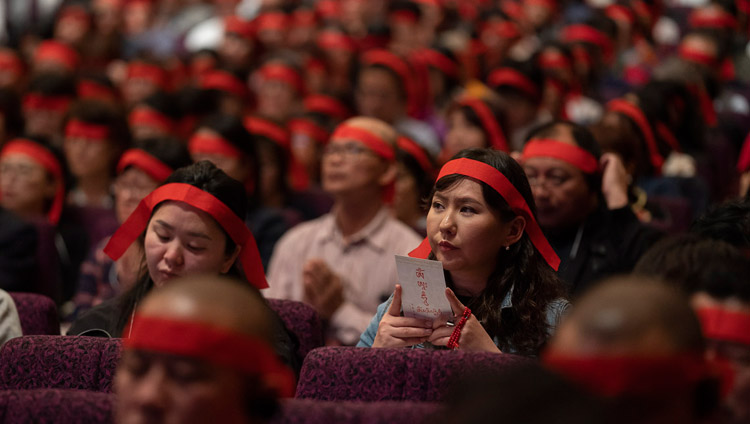 Members of the audience wearing ritual blindfolds during the Avalokiteshvara Empowerment given by His Holiness the Dalai Lama on the final day of his teachings in Yokohama, Japan on November 15, 2018. Photo by Tenzin Choejor