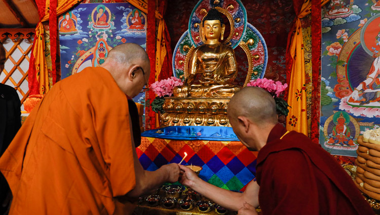 His Holiness the Dalai Lama lighting a butter lamp on his arrival at the temple at Sherab Kyetsel Ling Institute in Chiba, Japan on November 18, 2018. Photo by Tenzin Jigme