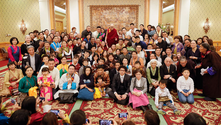 His Holiness the Dalai Lama posing for a group photo after his meeting with members of the Tibetan and Bhutanese communities in Tokyo, Japan on November 20, 2018. Photo by Tenzin Choejor His Holiness the Dalai Lama posing for a group photo after his meeting with members of the Tibetan and Bhutanese communities in Tokyo, Japan on November 20, 2018. Photo by Tenzin Choejor