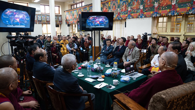 His Holiness the Dalai Lama and fellow participants watching Prof Yuan Tseh Lee's presentation on Challenges and Opportunities for a Sustainable Planet on the third day of the dialogue with Chinese scientists about quantum effects at the Main Tibetan Temple in Dharamsala, HP, India on November 3, 2018. Photo by Ven Tenzin Jamphel