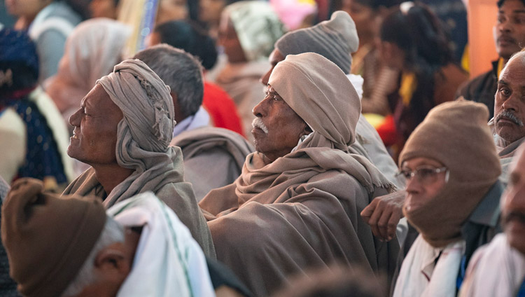 Some of the more than 15,000 people attending the teaching listening to His Holiness the Dalai Lama at the Youth Buddhist Society of India ground in Sankisa, UP, India on December 3, 2018. Photo by Lobsang Tsering