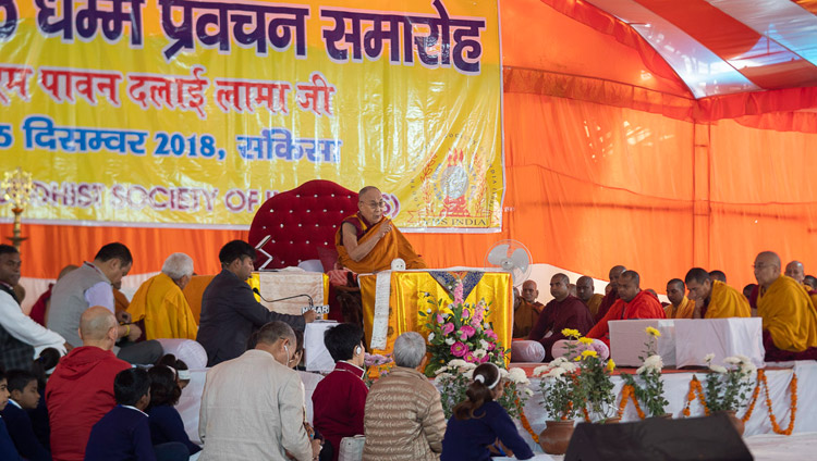 His Holiness the Dalai Lama speaking on the final day of his three day teaching in Sankisa, UP, India on December 5, 2018. Photo by Lobsang Tsering