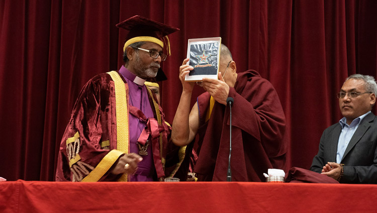 Rt. Revd. Warris K. Masih presenting His Holiness the Dalai Lama with the St Stephen's College crest at St Stephen's College Founder's Day celebration in New Delhi, India on December 7, 2018. Photo by Lobsang Tsering