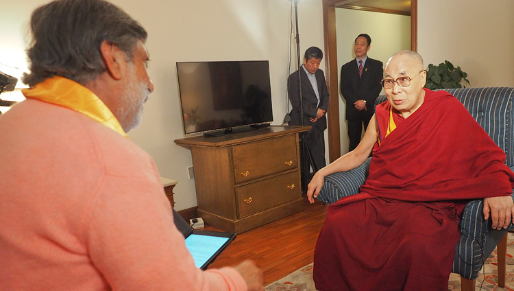 Ramesh Sharma interviewing His Holiness the Dalai Lama for his documentary about Gandhi’s message of non-violence in New Delhi, India on December 10, 2018. Photo by Jeremy Russell