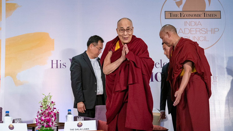 His Holiness the Dalai Lama greeting the audience on his arrival at the Maurya Sheraton Convention Hall to address the  India Leadership Council in New Delhi, India on December 10, 2018. Photo by Tenzin Choejor