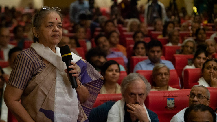 A member of the audience asking His Holiness the Dalai Lama a question after his address at the Conference on the Concept of ‘Maitri’ or ‘Metta’ in Buddhism at the University of Mumbai in Mumbai, India on December 12, 2018. Photo by Lobsang Tsering