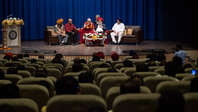 A view of the stage during His Holiness the Dalai Lama's talk at Guru Nanak College in Mumbai, India on December 13, 2018. Photo by Lobsang Tsering