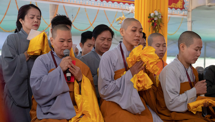 A group from Vietnam chanting the 'Heart Sutra' in Vietnamese at the start of the second day of His Holiness the Dalai Lama's teachings in Bodhgaya, Bihar, India on December 25, 2018. Photo by Lobsang Tsering