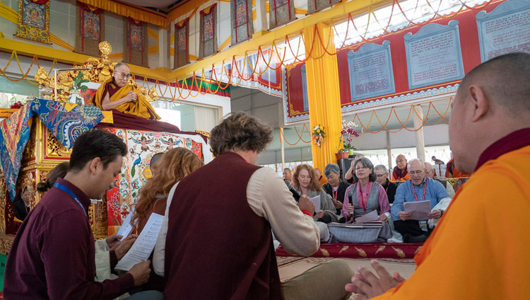 Westerners singing the ‘Heart Sutra’ in English at the start of the Solitary Hero Vajrabhairava Empowerment given by His Holiness the Dalai Lama in Bodhgaya, Bihar, India on December 26, 2018. Photo by Lobsang Tsering