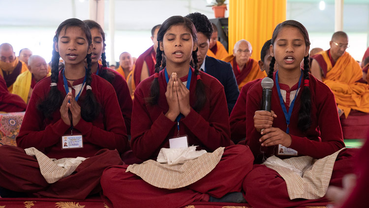 Students from the Maitreya School chanted the Heart Sutra in Sanskrit at the start of the first day of the  Manjushri Cycle of Teachings in Bodhgaya, Bihar, India on December 28, 2018. Photo by Lobsang Tsering