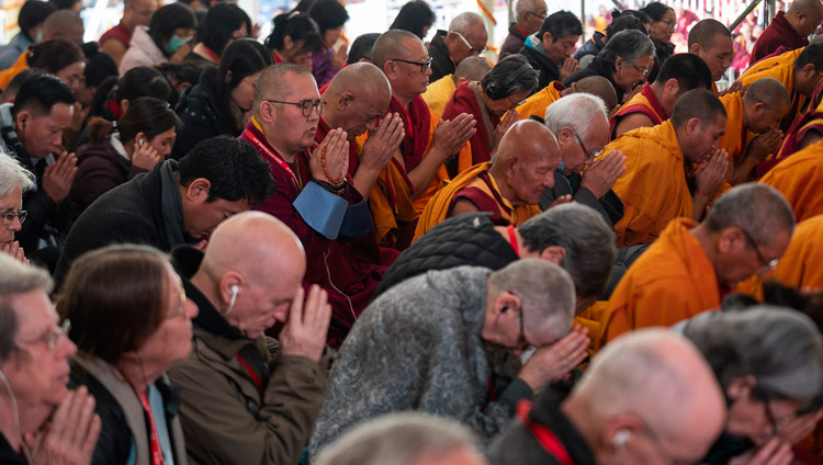 Members of the crowd of more than 15,000 following His Holiness guidance as he gives Permissions of the Manjushri Cycle of Teachings in Bodhgaya, Bihar, India on December 28, 2018. Photo by Lobsang Tsering