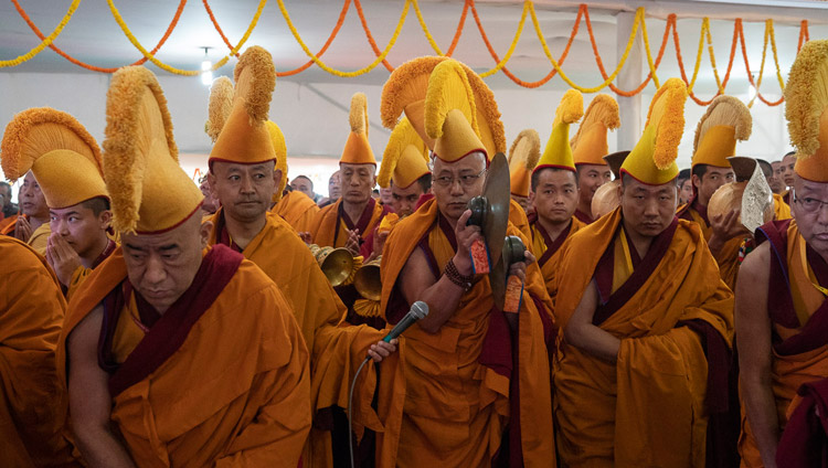 Namgyal Monastery monks playing traditional instruments announce His Holiness the Dalai Lama's arrival at the Kalachakra Ground in Bodhgaya, Bihar, India on December 31, 2018. Photo by Lobsang Tsering