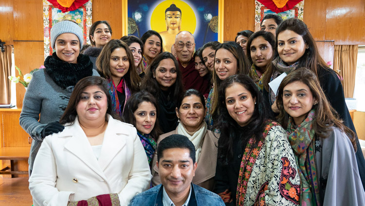 His Holiness the Dalai Lama posing for a group photo with members of the audience after his meeting with women from the Young FICCI Ladies Organisation at his residence in Dharamsala, HP, India on February 18, 2019. Photo by Tenzin Choejor