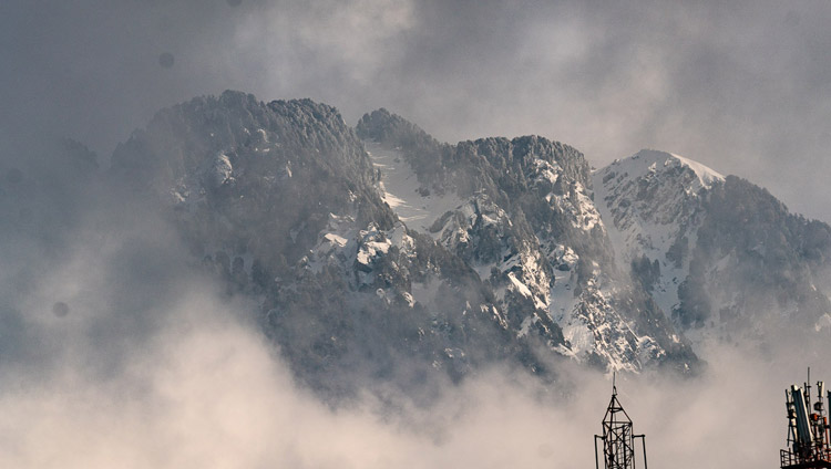 Fresh snow on the mountains behind Dharamsala on the morning of the Day of Miracles in Dharamsala, HP, India on February 19, 2019. Photo by Tenzin Choejor