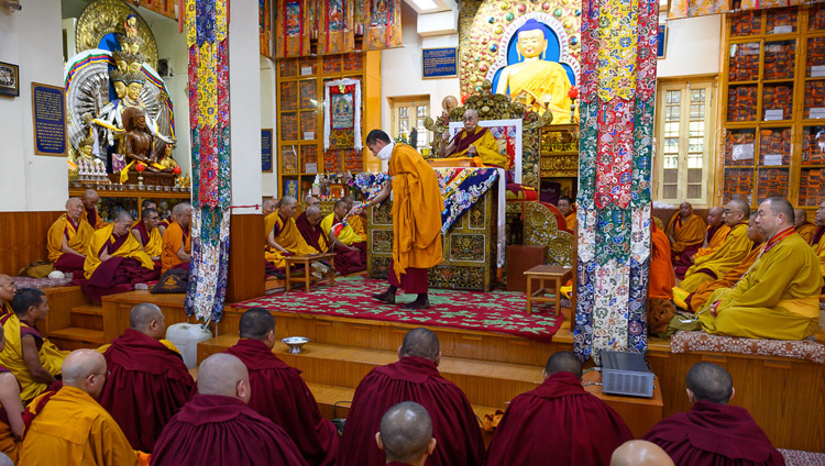 His Holiness the Dalai Lama explaining Manjushri Permission he will give on the final session of his teachings at the Main Tibetan Temple in Dharamsala, HP, India on February 23, 2019. Photo by Tenzin Choejor