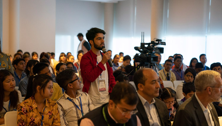 A member of the audience asking His Holiness the Dalai Lama a question during his meeting with group of students and teachers from South Asian countries who have been taking part in workshops about universal values and secular ethics in New Delhi, India on April 4, 2019. Photo by Tenzin Choejor