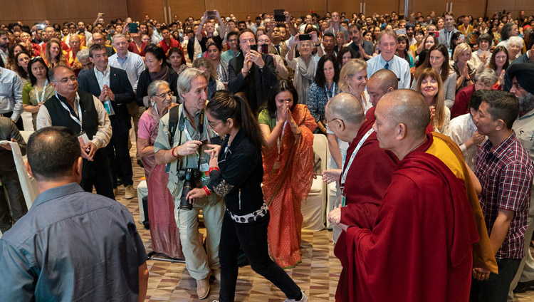 His Holiness the Dalai Lama arriving at the meeting hall for the unveiling of the SEE Learning curriculum in New Delhi, India on April 5, 2019. Photo by Tenzin Choejor