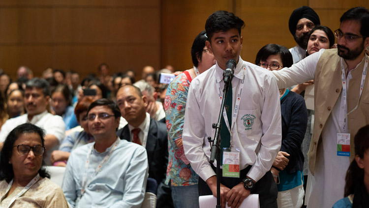 A member of the audience asking His Holiness the Dalai Lama a question on the second day of the SEE Learning global launch in New Delhi, India on April 6, 2019. Photo by Tenzin Choejor
