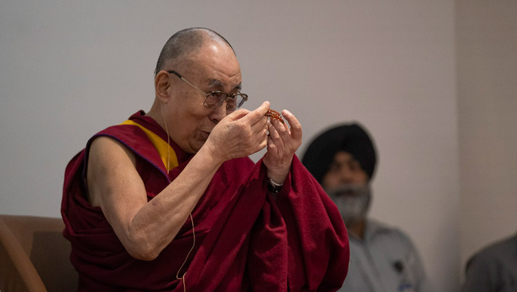 His Holiness the Dalai Lama using his rosary to explain a point during his talk to Youth Global Leaders in New Delhi, India on April 7, 2019. Photo by Tenzin Choejor