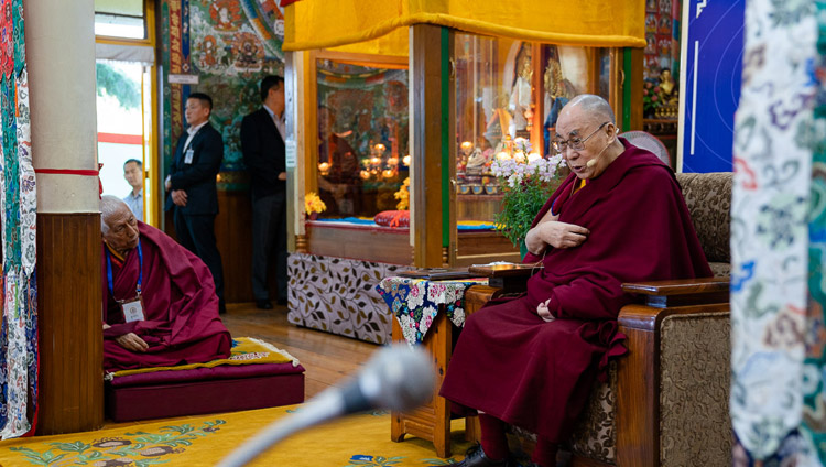 Samdhong Rinpoche looks on as His Holiness the Dalai Lama delivers his opening remarks at the First Conference on Kalachakra at the Kalachakra Temple in Dharamsala, HP, India on May 5, 2019. Photo by Tenzin Choejor