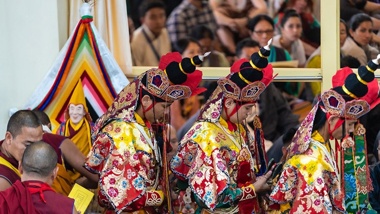 Namgyal Monks dressed in traditional costume taking part in the  Long Life Offering Cereony for His Holiness the Dalai Lama at the Main Tibetan Temple in Dharamsala, HP, India on July 5, 2019. Photo by Tenzin Choejor