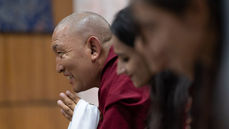 Founder of Tong-Leng, Ven Jamyang, a small charity working with displaced Indian communities in the area around Dharamsala, listening to His Holiness the Dalai Lama speaking during their meeting in Dharamsala, HP, India on July 7, 2019. Photo by Tenzin Choejor