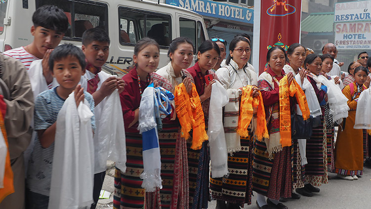 Local people lining the road to catch a glimpse of His Holiness the Dalai Lama as his motorcade makes its way to Manali, HP, India on August 10, 2019. Photo by Jeremy Russell