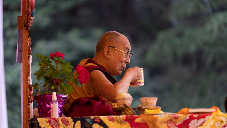 His Holiness the Dalai Lama enjoying a cup of tea during a break on the first day of his teachings in Manali, HP, India on August 13, 2019. Photo by Tenzin Choejor