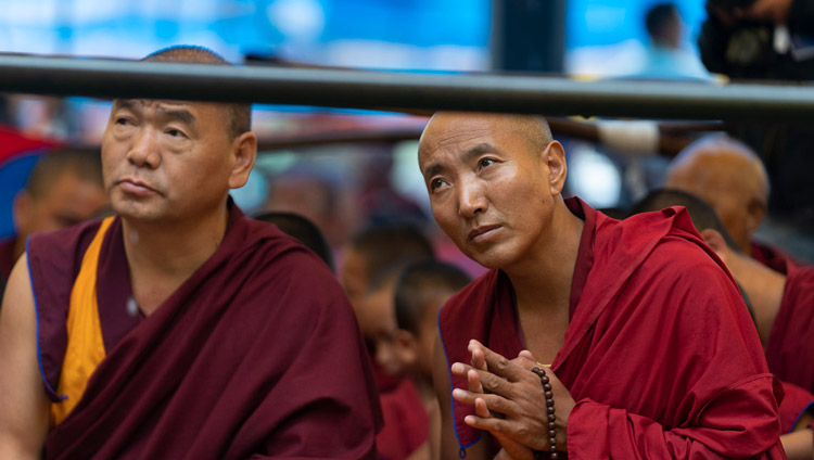 Members of the crowd watching as His Holiness the Dalai Lama performs preparatory rituals for the Empowerment of Mahakarunika Lokeshvara in Manali, HP, India on August 17, 2019. Photo by Tenzin Choejor