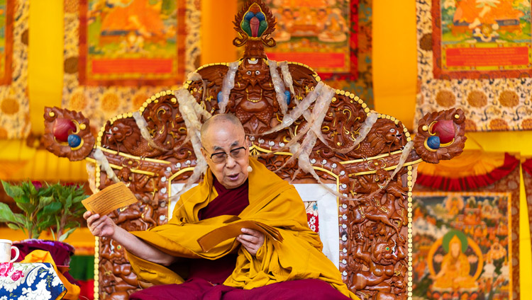 His Holiness the Dalai Lama reading from the text on the final day of his teachings in Manali, HP, India on August 18, 2019. Photo by Tenzin Choejor