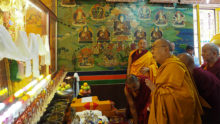 His Holiness the Dalai Lama paying his respects before the statues of the Buddha and Avalokiteshvara before taking his seat at Ön Ngari Monastery in Manali, HP, India on August 23, 2019. Photo by Jeremy Russell