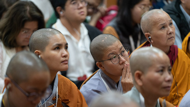 Members of the audience from Asia sitting inside the Main Tibetan Temple listening to His Holiness the Dalai Lama speaking on the first day of his teachings in Dharamsala, HP, India on September 4, 2019. Photo by Tenzin Choejor