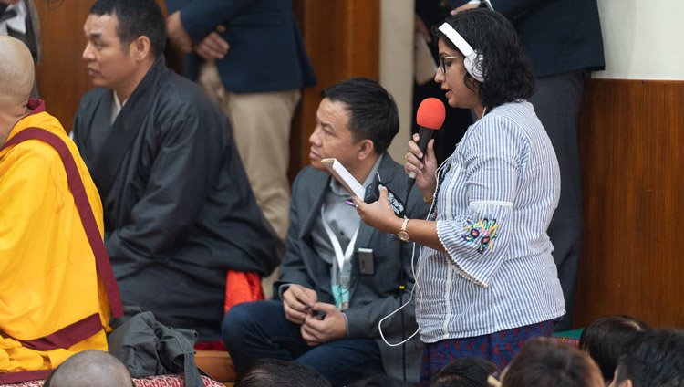 A member of the audience asking His Hoiness the Dalai Lama a question on the second day of teachings at the Main Tibetan Temple in Dharamsala, HP, India on September 5, 2019. Photo by Tenzin Choejor