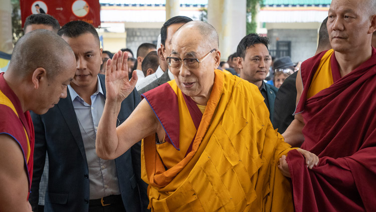 His Holiness the Dalai Lama waving to the crowd as he walks to the Main Tibetan Temple on the third day of his teachings at the request of groups from Asia in Dharamsala, HP, India on September 6, 2019. Photo by Matteo Passigato