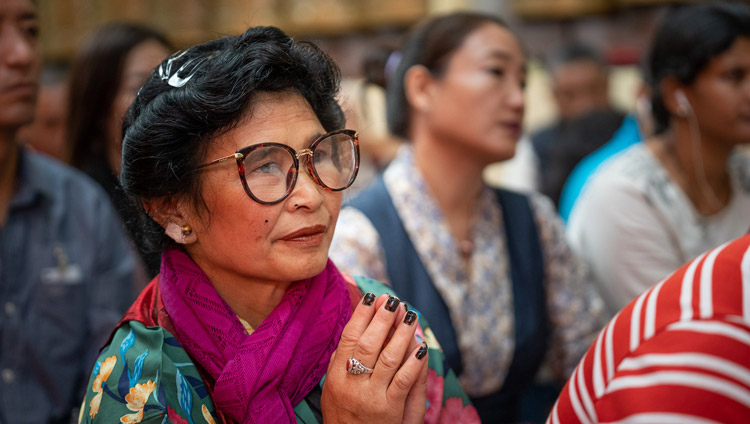 Members of the audience listening to His Holiness the Dalai Lama on the third day of his teachings at the Main Tibetan Temple in Dharamsala, HP, India on September 6, 2019. Photo by Matteo Passigato