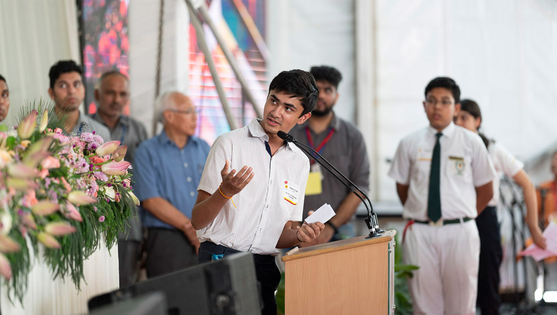 A student asking His Holiness the Dalai Lama a question during his talk at Shri Ram School in, New Delhi, India on September 20, 2019. Photo by Tenzin Choejor