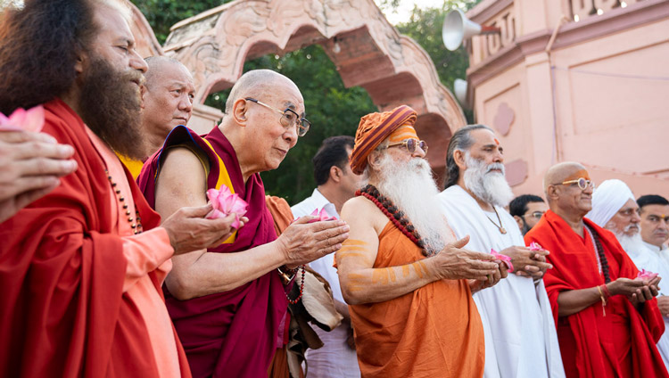 His Holiness the Dalai Lama taking part in an aarti ritual at the banks of the Yamuna river in Mathura, UP, India on September 23, 2019. Photo by Tenzin Choejor