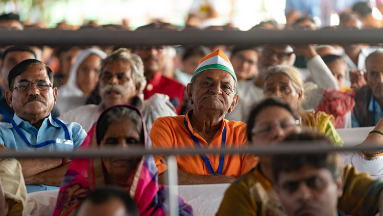 Members of the audience listening to His Holiness the Dalai Lama during the interfaith program at Gandhi Ashram in New Delhi, India on September 25, 2019. Photo by Tenzin Choejor