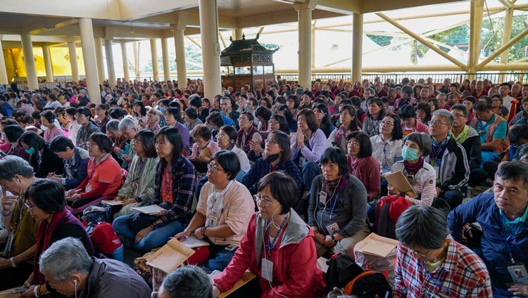 Members of the audience sitting on the veranda of the Main Tibetan Temple listening to His Holiness the Dalai Lama on the first day of his teachings in Dharamsala, HP, India on October 3, 2019. Photo by Ven Tenzin Jamphel