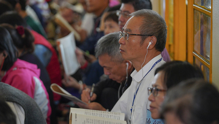 Members of the audience, some of the more than 1100 from Taiwan attending the teachings, listening to His Holiness the Dalai Lama at the Main Tibetan Temple in Dharamsala, HP, India on October 4, 2019. Photo by Ven Tenzin Jamphel