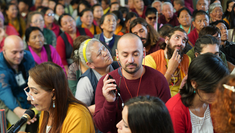 Members of the audience from over 61 countries listening to translations of His Holiness the Dalai Lama's final day of teachings at the Main Tibetan Temple in Dharamsala, HP, India on October 5, 2019. Photo by Ven Tenzin Jamphel