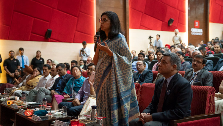A member of the audience asking His Holiness the Dalai Lama a question during his talk at the inauguration of Chitkara University’s 11th Global Week in Chandigarh, India on October 14, 2019. Photo by Tenzin Choejor