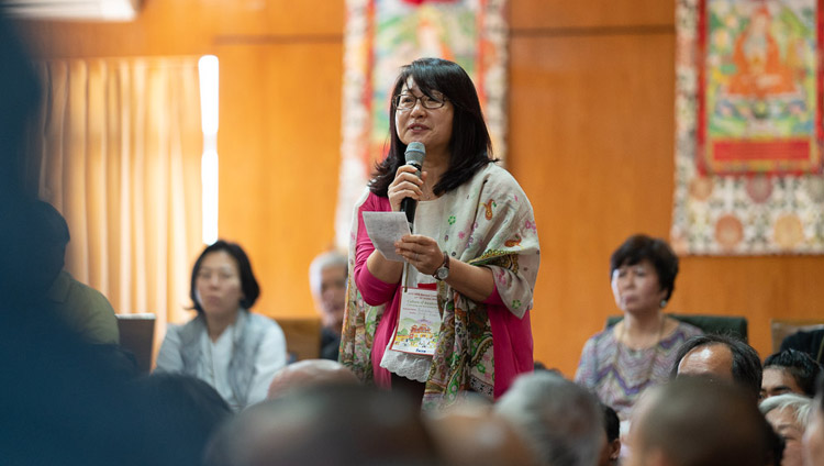 A member of the audience asking His Holiness the Dalai Lama a question during his meeting with members of the International Network of Engaged Buddhists at his residence in Dharamsala, HP, India on October 21, 2019. Photo by Tenzin Choejor