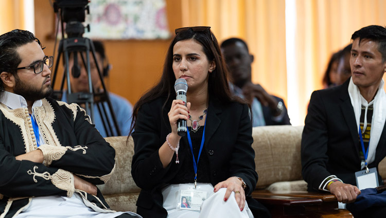 A young peacebuilder sharing her experiences with His Holiness the Dalai Lama during their conversation at his residence in Dharamsala, HP, India on October 23, 2019. Photo by Tenzin Choejor