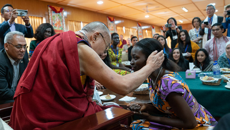 His Holiness the Dalai Lama thanking a young woman for participating in the conversation with young peacebuilders organized by the United States Institute of Peace at his residence in Dharamsala, HP, India on October 24, 2019. Photo by Tenzin Choejor His Holiness the Dalai Lama thanking a young woman for participating in the conversation with young peacebuilders organized by the United States Institute of Peace at his residence in Dharamsala, HP, India on October 24, 2019. Photo by Tenzin Choejor
