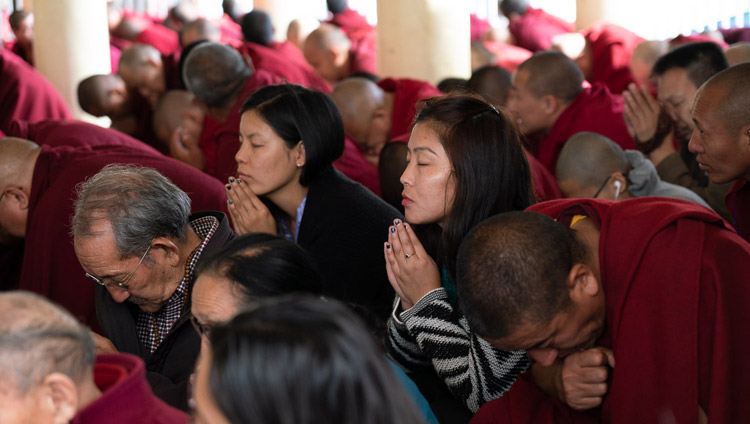 Members of the audience taking the bodhisattva vow on the final day of His Holiness the Dalai Lama's teachings at the Main Tibetan Temple in Dharamsala, HP, India on November 6, 2019. Photo by Ven Tenzin Jamphel